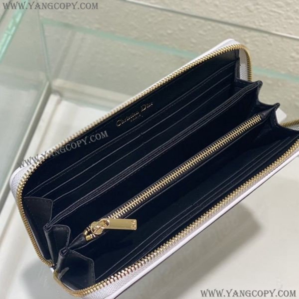 ディオール コピー VIBE VOYAGEUR ラウンドジップ長財布 def99099